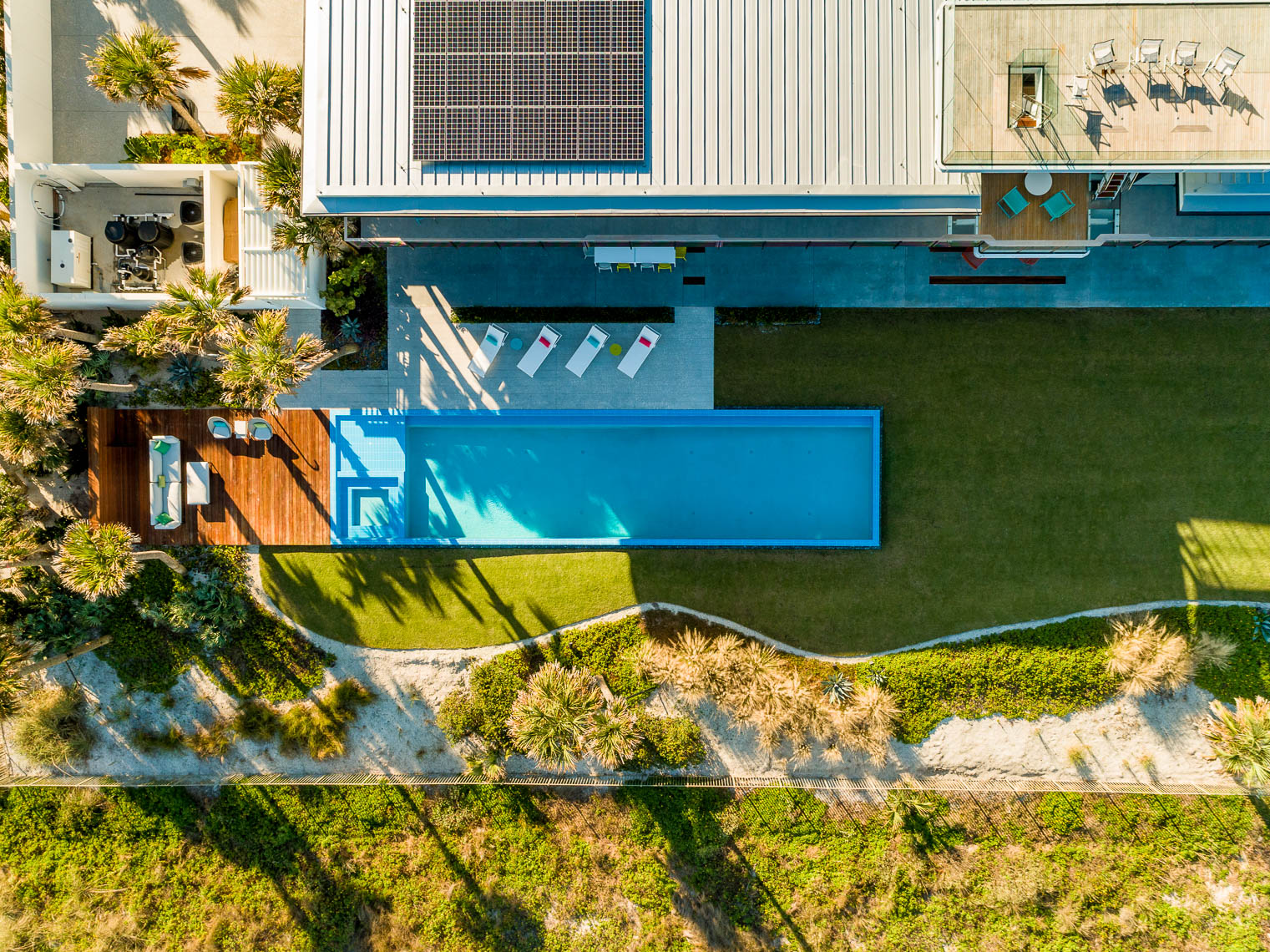 Overhead drone shot of a luxury residential pool