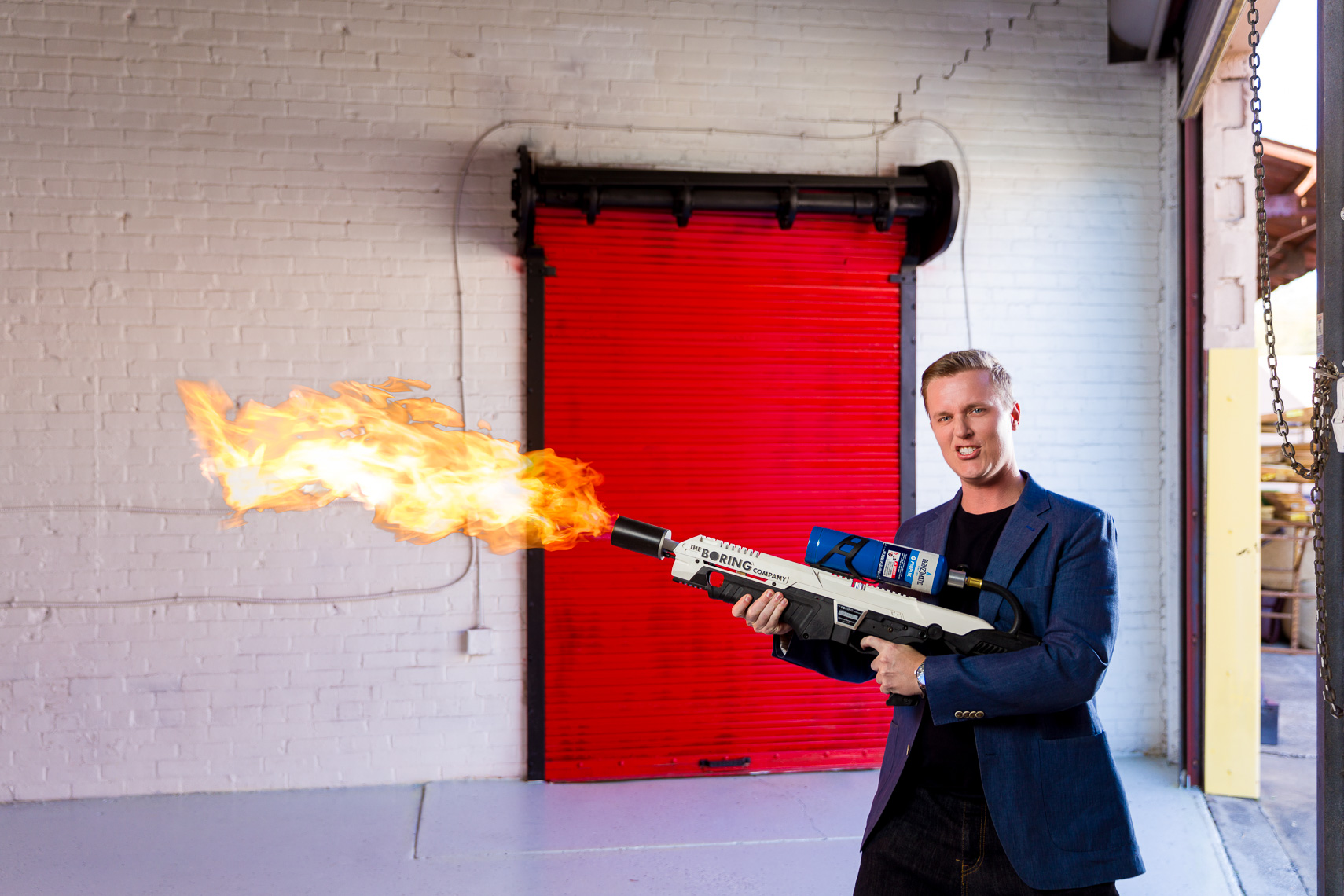 Corporate portraits with a flame thrower and a red door