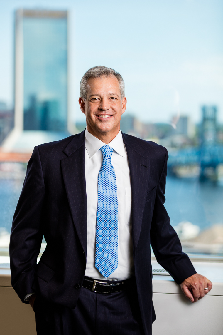 Portrait of an executive with a citscape background