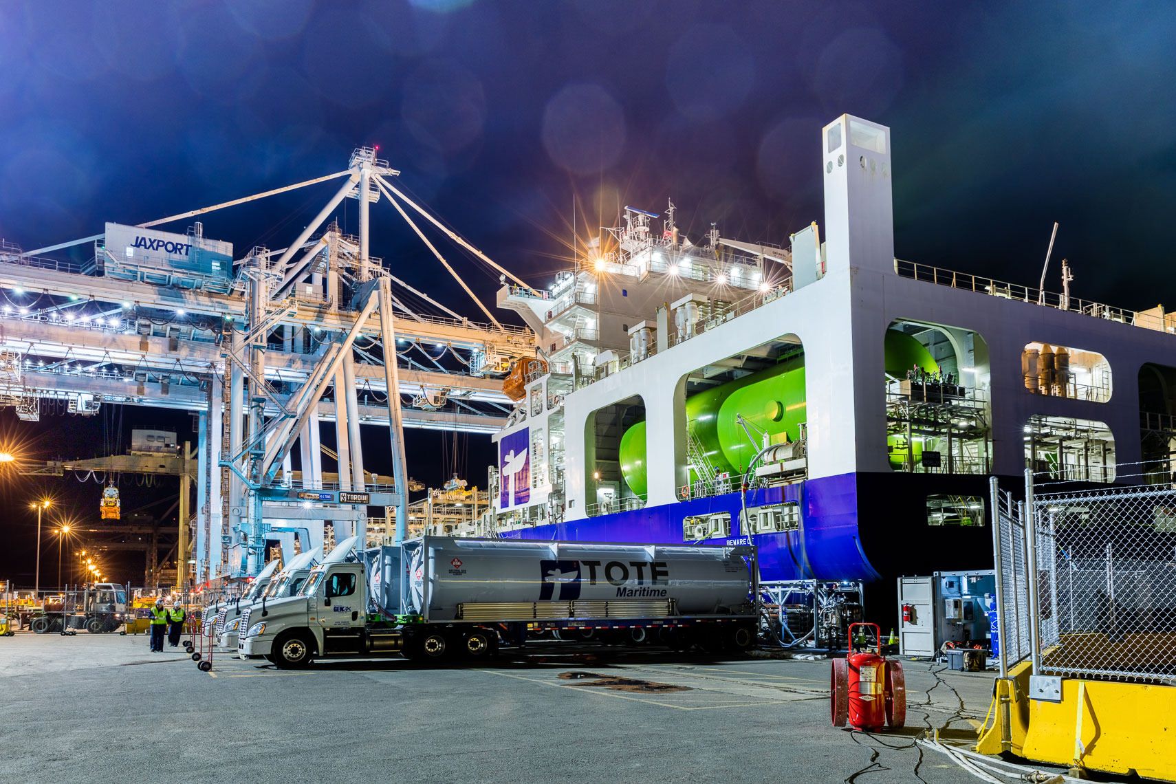 LNG trucks refill the LNG tanks on Tote Maritime