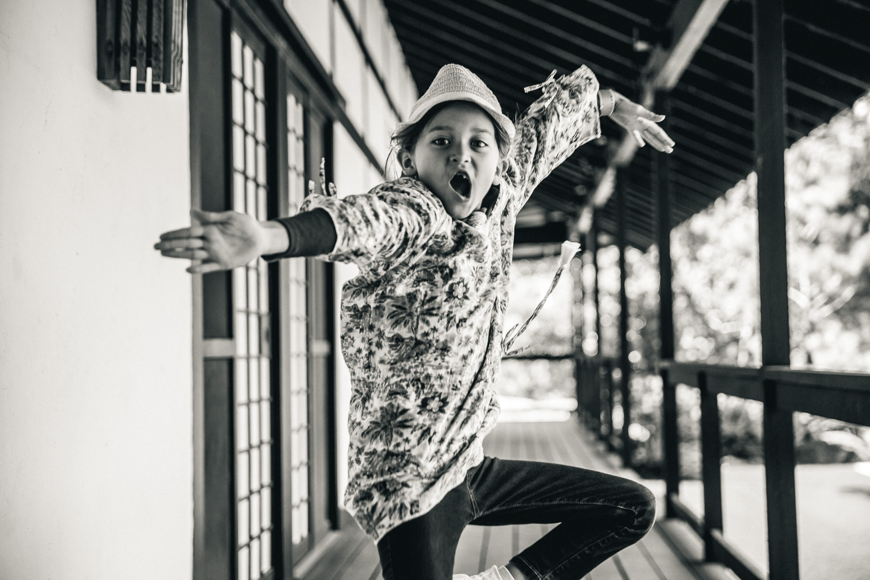 An energetic young kid jumping