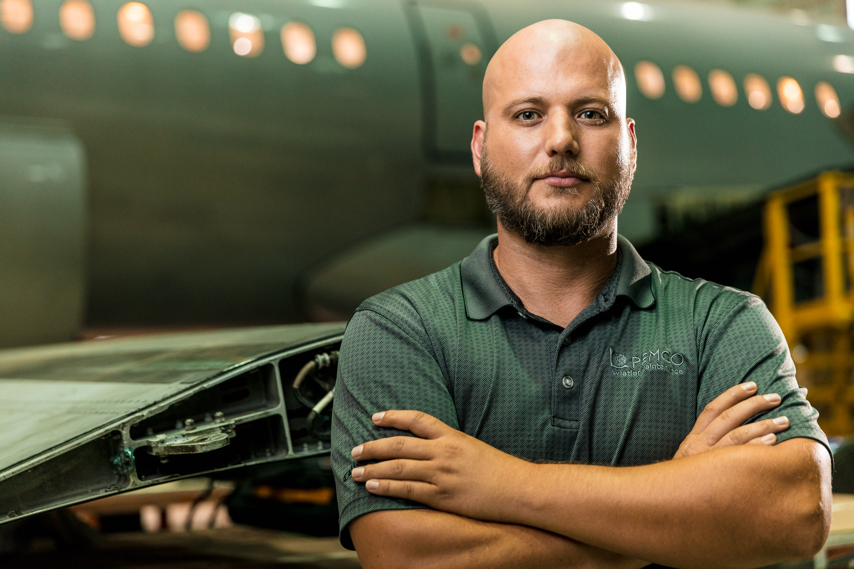 Portrait of a man in front of an airplane